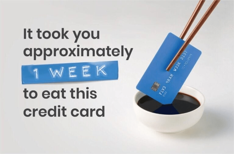 Credit card held by chopsticks above a bowl of soy sauce, with the text "It took you approximately 1 WEEK to eat this credit card."