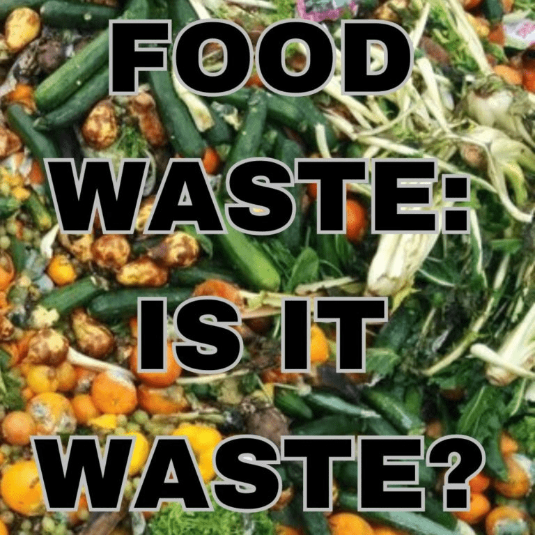 A vibrant pile of discarded fruits and vegetables, questioning if food waste can be repurposed rather than discarded.